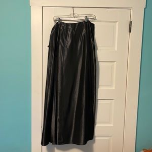 Full length charcoal gray skirt. Satin like material.